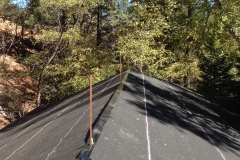 Sloped roof with lightning rods.